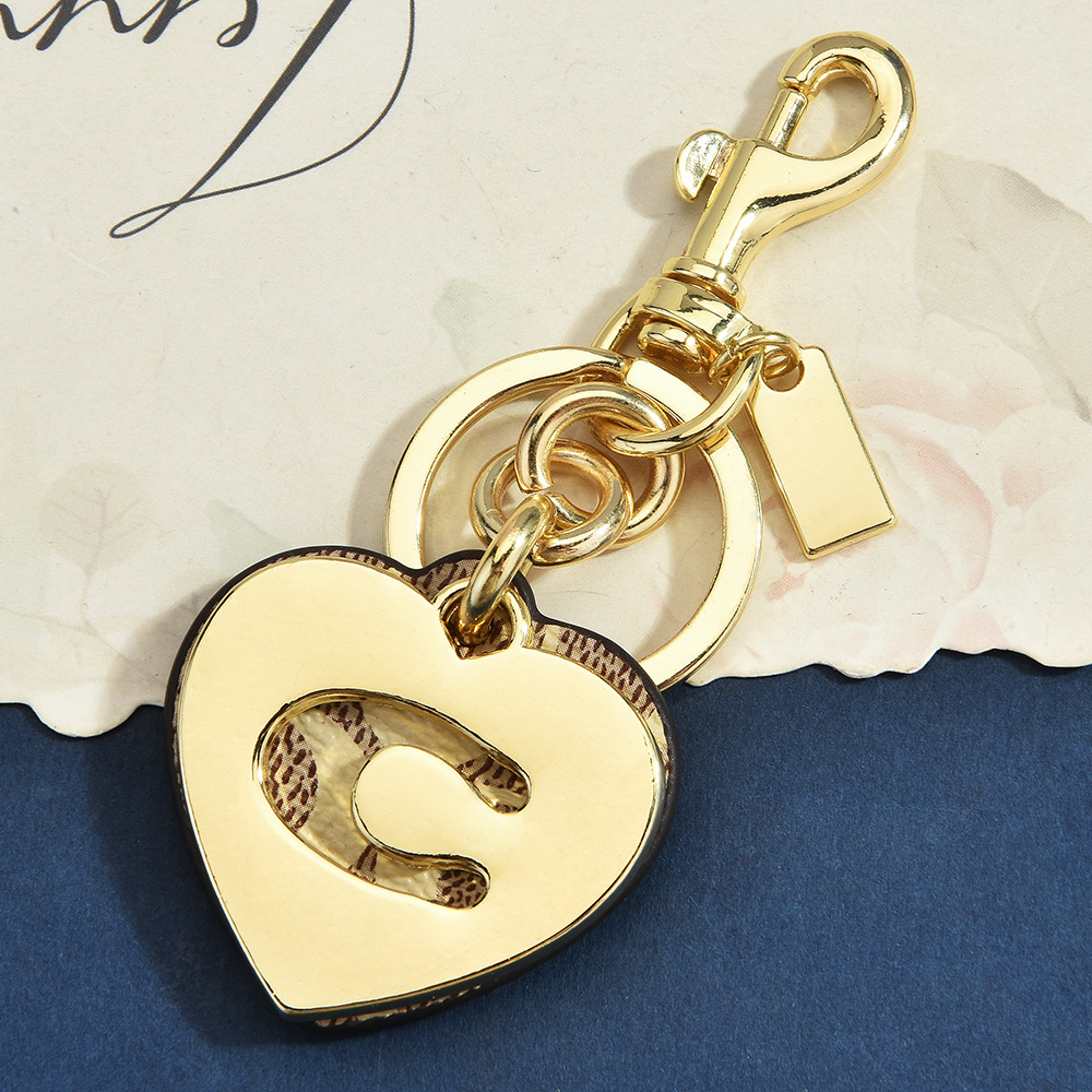 Initial C Monogram Bag Charm K - огляд і ціна Monogram Keychain Leather